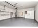 Spacious garage with ample storage and epoxy-coated floor at 17563 Hawks View Dr, Fort Mill, SC 29707