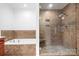 Modern bathroom featuring a tiled shower with glass door and a luxurious soaking tub at 1790 Kathy St, Newton, NC 28658