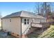 Back exterior view of home with a cozy deck, perfect for outdoor entertainment at 1790 Kathy St, Newton, NC 28658