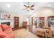 The warm and inviting living room features hardwood floors, a vaulted ceiling, and an elegant fireplace at 1790 Kathy St, Newton, NC 28658