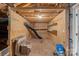 Unfinished basement area with shelving and storage at 220 Ambleside Village Ln, Davidson, NC 28036