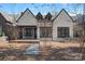 Charming house exterior with stone and stucco siding at 220 Ambleside Village Ln, Davidson, NC 28036