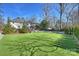 Expansive backyard with artificial turf and pool at 2240 Mecklenburg Ave, Charlotte, NC 28205