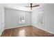 Bright bedroom featuring hardwood floors and window blinds at 2240 Mecklenburg Ave, Charlotte, NC 28205