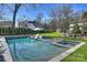 Inviting swimming pool with spa and expansive backyard at 2240 Mecklenburg Ave, Charlotte, NC 28205