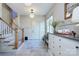 Hallway with staircase, storage cabinets, and decor at 2270 New Gray Rock Rd, Fort Mill, SC 29708