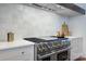 Close-up of a kitchen with stainless steel oven, light countertops and neutral backsplash at 2270 New Gray Rock Rd, Fort Mill, SC 29708