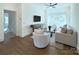 Comfortable living room with hardwood floors, lots of natural light, modern furniture and a ceiling fan at 2270 New Gray Rock Rd, Fort Mill, SC 29708