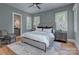 Serene main bedroom featuring a plush bed, soft colors, and well-lit windows at 2270 New Gray Rock Rd, Fort Mill, SC 29708