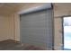 Insulated garage with roll-up door at 291 Patterson Farm Rd, Mooresville, NC 28115