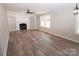 Spacious living room with fireplace and built-in shelving at 291 Patterson Farm Rd, Mooresville, NC 28115