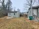 Spacious backyard with storage shed and mature trees at 301 W Hartford Ave, Bessemer City, NC 28016