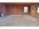 Unfinished garage interior with concrete floor at 301 W Hartford Ave, Bessemer City, NC 28016