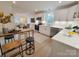 Modern white kitchen with stainless steel appliances and quartz countertops at 301 W Hartford Ave, Bessemer City, NC 28016