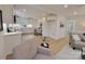 Modern white kitchen with stainless steel appliances and quartz countertops at 301 W Hartford Ave, Bessemer City, NC 28016