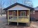 Covered deck with metal railing and access from slider at 303 Patterson Farm Rd, Mooresville, NC 28115