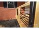 Close up of the wooden and metal railing on the deck at 303 Patterson Farm Rd, Mooresville, NC 28115