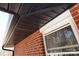 Brick home exterior with black covered patio at 303 Patterson Farm Rd, Mooresville, NC 28115