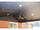 Covered patio with black ceiling, recessed lighting and fan at 303 Patterson Farm Rd, Mooresville, NC 28115