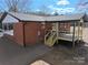 Brick house with new wooden deck and steps at 303 Patterson Farm Rd, Mooresville, NC 28115