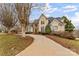 Two-story house with stone accents and a large driveway at 308 41St Avenue Nw Pl, Hickory, NC 28601