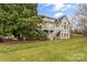 Back exterior view of house showing deck and landscaping at 308 41St Avenue Nw Pl, Hickory, NC 28601