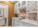 Wet bar with white cabinetry and granite countertops at 308 41St Avenue Nw Pl, Hickory, NC 28601