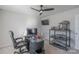 Well-lit bedroom with a unique gaming setup and sleek black desk. Includes a ceiling fan at 3575 Cerelia Ln, Denver, NC 28037