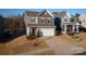 Charming two-story home featuring a two-car garage and well-maintained landscaping at 3575 Cerelia Ln, Denver, NC 28037