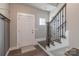 Welcoming foyer with staircase and wood-look flooring by the front door at 3575 Cerelia Ln, Denver, NC 28037