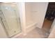 Bathroom with shower, bathtub, and walk-in closet at 4134 Richard Andrew Dr, Matthews, NC 28105