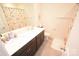 Clean bathroom, double vanity, toilet and shower at 4134 Richard Andrew Dr, Matthews, NC 28105