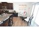 Bright dining area with glass table and four chairs near kitchen at 4134 Richard Andrew Dr, Matthews, NC 28105