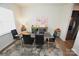 Bright dining area with a glass table and modern decor at 4134 Richard Andrew Dr, Matthews, NC 28105