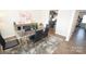 Dining room featuring a glass table, black chairs, and a modern aesthetic at 4134 Richard Andrew Dr, Matthews, NC 28105