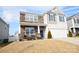 Two-story house with stone and siding, two-car garage, and landscaping at 4134 Richard Andrew Dr, Matthews, NC 28105