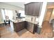 Modern kitchen with stainless steel appliances and granite countertops at 4134 Richard Andrew Dr, Matthews, NC 28105