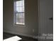 Bedroom with window, blinds, and wood-look floors at 426 Sellerstown Rd, Kings Mountain, NC 28086