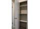 Well-lit pantry with three shelves for storage at 426 Sellerstown Rd, Kings Mountain, NC 28086