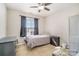 Cozy bedroom with a single bed and ample natural light at 4301 Windjammer Sw Ct, Concord, NC 28027