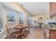 Eat-in kitchen with bay window and access to deck at 4301 Windjammer Sw Ct, Concord, NC 28027