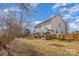 A full view of the backyard featuring a deck, pergola, and a fenced perimeter at 4763 Brockton Nw Ct, Concord, NC 28027