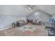 Bright bonus room with sloped ceilings, neutral carpet and plenty of space for entertaining at 4763 Brockton Nw Ct, Concord, NC 28027