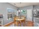 Breakfast nook with hardwood floors, large window, and gray walls at 4763 Brockton Nw Ct, Concord, NC 28027