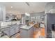 Modern kitchen with stainless steel appliances, island and hardwood floors at 4763 Brockton Nw Ct, Concord, NC 28027