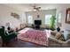 Inviting living room with hardwood floors, a ceiling fan, and plenty of natural light at 5047 Summer Surprise Ln, Charlotte, NC 28215