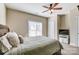 Bright bedroom with window, ceiling fan and neutral decor at 573 Church St, Locust, NC 28097