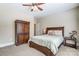 Bedroom with wooden furniture and neutral color scheme at 573 Church St, Locust, NC 28097