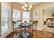 Charming dining area with hardwood floors and a window seat at 573 Church St, Locust, NC 28097