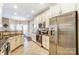 Spacious kitchen with granite countertops and stainless steel appliances at 573 Church St, Locust, NC 28097